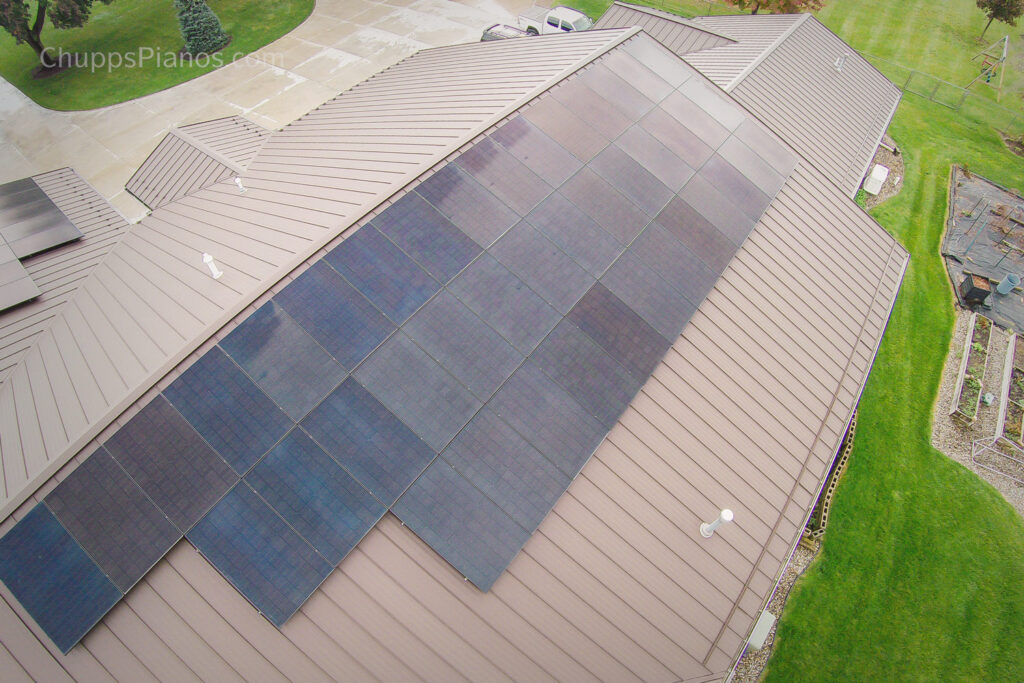 Solar panels on top of the Chupp's Piano Service, Inc. shop - 2024